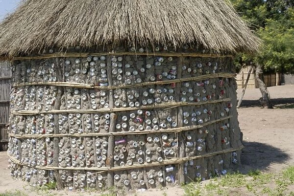 Recycling of aluminium cans as used in traditional house, Botswana, Africa