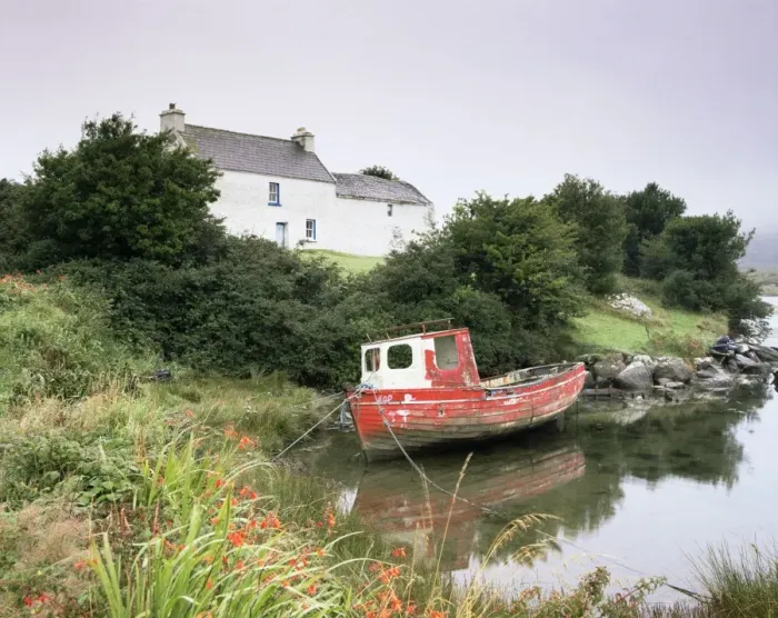Framed Print : Red boat and house Framed Print : Red boat and house