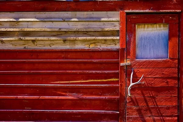 Red door in Polebridge, Montana, United States of America, North America