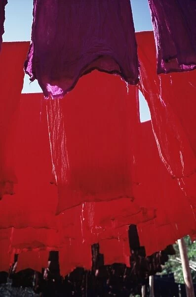 Red dyed cloth drying
