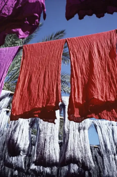 Framed Print : Red dyed cloth and silk drying Framed Print : Red dyed cloth and silk drying