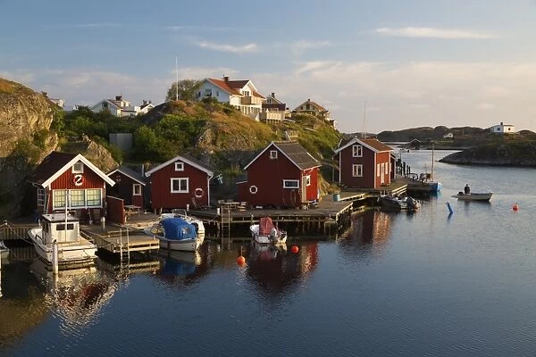 Red fishermens huts by harbour and archipelago, Stocken, Orust, Bohuslan Coast, Southwest Sweden