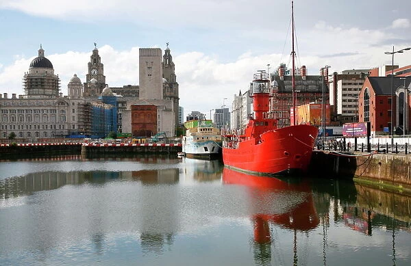 The red lightship at Canning Dock next to Albert Dock with the Liver building in the background