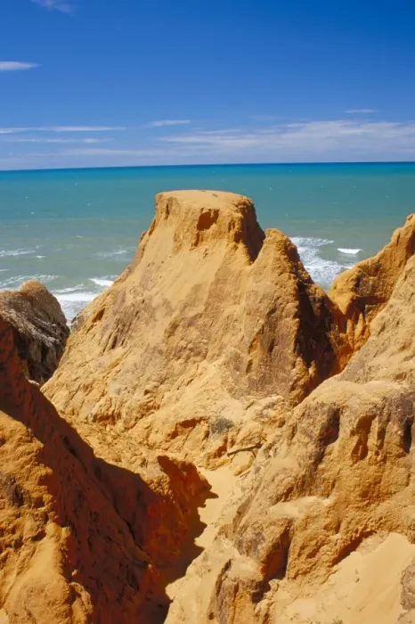 Framed Print : Red rock formations of Morro Branco on the Ceara coastline, near Canoa Quedrada