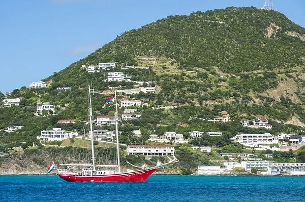 Red sailing boat in the bay of Philipsburg, Sint Maarten, West Indies, Caribbean
