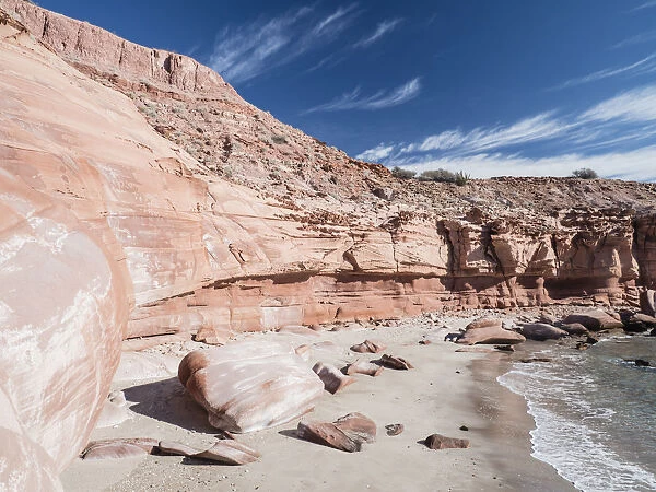 Red sandstone cliffs at Puerto Gato, Baja California Sur, Mexico, North America