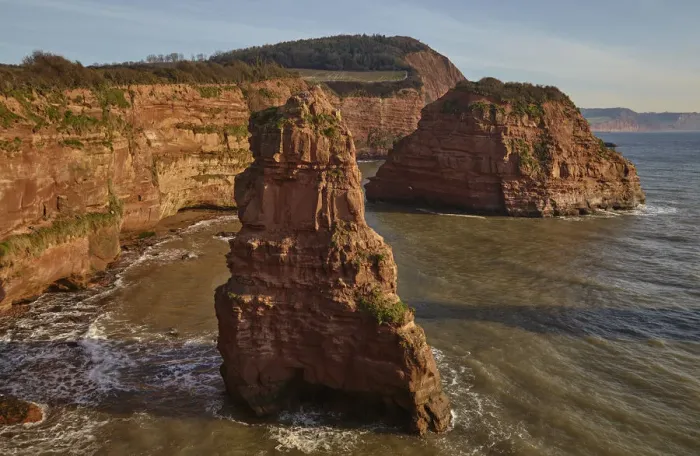 Framed Print : Red sandstone cliffs and rocks at Ladram Bay, in the Jurassic Coast UNESCO World Heritage Framed Print : Red sandstone cliffs and rocks at Ladram Bay, in the Jurassic Coast UNESCO World Heritage