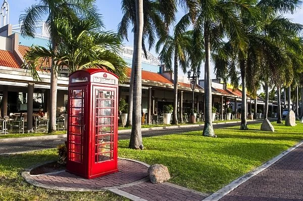 Red telephone box in downtown Oranjestad, capital of Aruba, ABC Islands, Netherlands Antilles, Caribbean, Central America