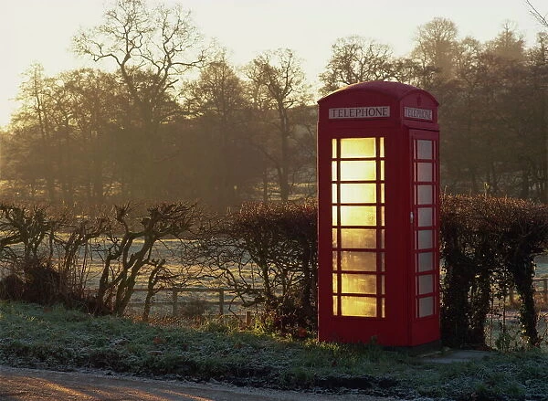 Red telephone box, on a frosty morning in early light, Snelston, Hartington