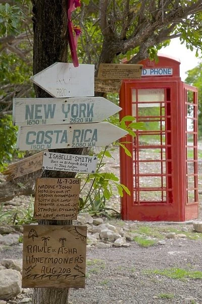 Red Telephone Box and signs at Mama Pastas, Long Bay, Antigua, Leeward Islands, West Indies, Caribbean, Central America