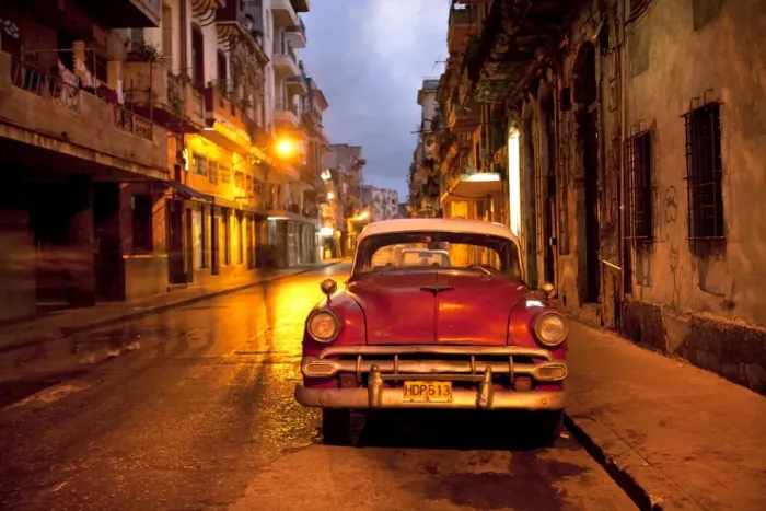 Framed Print : Red vintage American car parked on a floodlit street in Havana Centro at night, Havana, Cuba, West Indies, Central America Framed Print : Red vintage American car parked on a floodlit street in Havana Centro at night, Havana, Cuba, West Indies, Central America