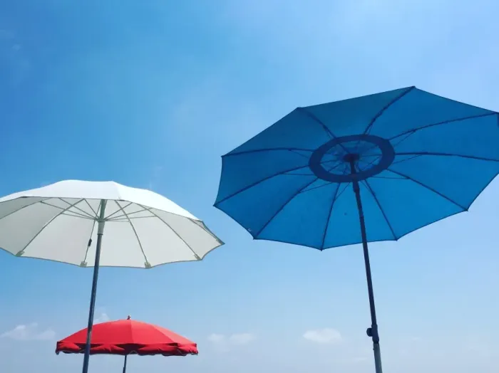 Framed Print : Red, white and blue beach parasols against a blue sky, Nice, Alpes Maritimes, Cote d Azur Framed Print : Red, white and blue beach parasols against a blue sky, Nice, Alpes Maritimes, Cote d Azur