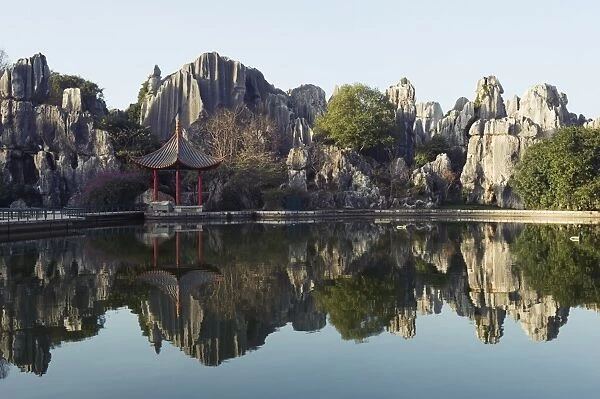 Reflection of karst scenery at Shilin Stone Forest, UNESCO World Heritage Site