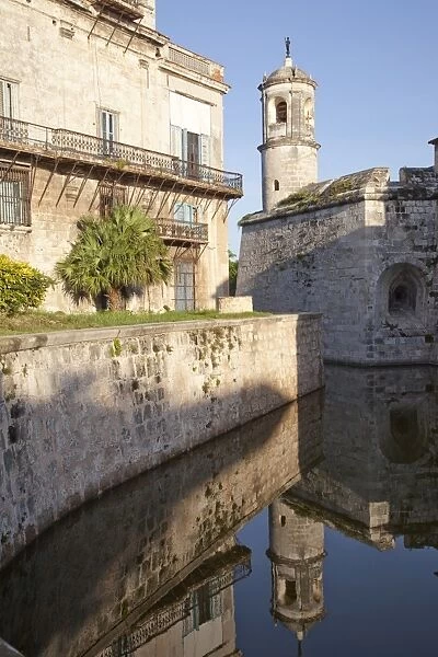Reflection in moat of the tower of the Fortress of Real Fuerza in Old Havana