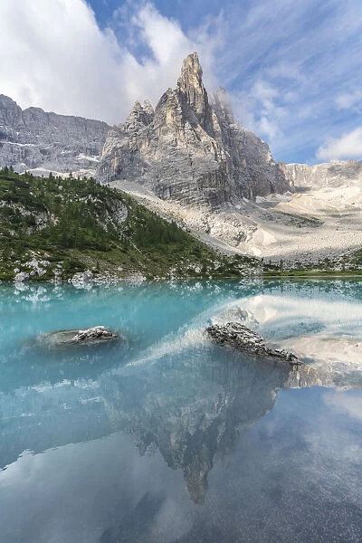 Reflection of Sorapis Group on Sorapis Lake in summer. Cortina d Ampezzo, Belluno province