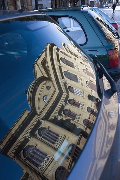 Reflection of Teatro Massimo in car