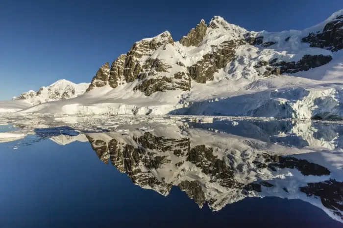 Framed Print : Reflections in the calm waters of the Lemaire Channel, Antarctica, Polar Regions Framed Print : Reflections in the calm waters of the Lemaire Channel, Antarctica, Polar Regions