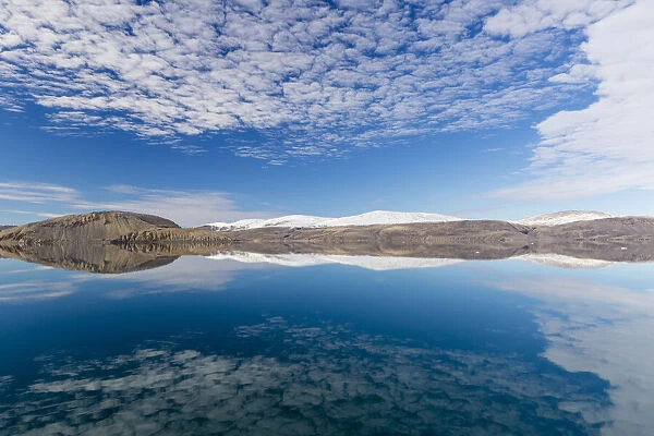 Reflections in the calm waters of Makinson Inlet, Ellesmere Island, Nunavut, Canada