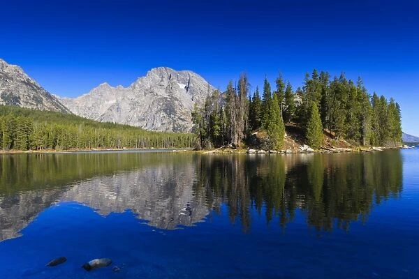 Reflections in Leigh Lake, Grand Teton National Park, Wyoming, United States of America, North America