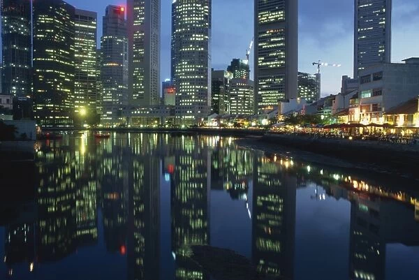 Reflections of the lights of buildings on Boat Quay