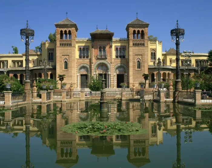 Framed Print : Reflections in the lily pond of buildings on the Plaza de Espana in the city of Seville Framed Print : Reflections in the lily pond of buildings on the Plaza de Espana in the city of Seville