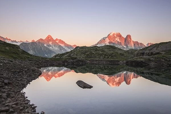 Reflections of Mont Blanc at sunset on Lac des Cheserys, Haute Savoie, French Alps