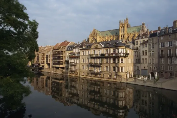 Framed Print : Reflections in water of buildings, with the Cathedral of St. Etienne in the background Framed Print : Reflections in water of buildings, with the Cathedral of St. Etienne in the background