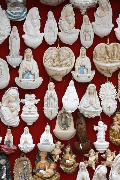 Religious sculptures sold in Lourdes, Lourdes, Hautes Pyrenees, France, Europe