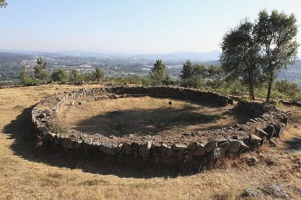 Remains of a round house in the Celtic hill settlement dating to the Iron Age at Citania de Briteiros, Minho