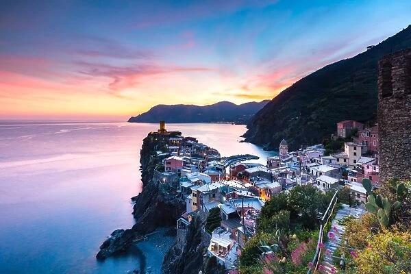 The remains of a stunning sunset over the old town and harbour of Vernazza, Cinque Terre