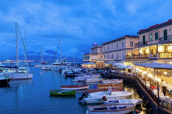 Restaurant, Naples Harbour with Mount Vesuvius in the Background at Dusk, Naples, Campania, Italy, Europe