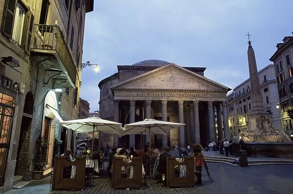 Restaurant and the Pantheon illuminated at dusk