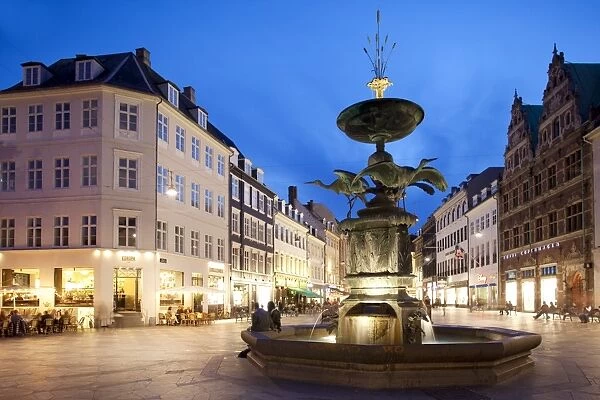 Restaurants and fountain at dusk, Armagertorv, Copenhagen, Denmark, Scandinavia, Europe