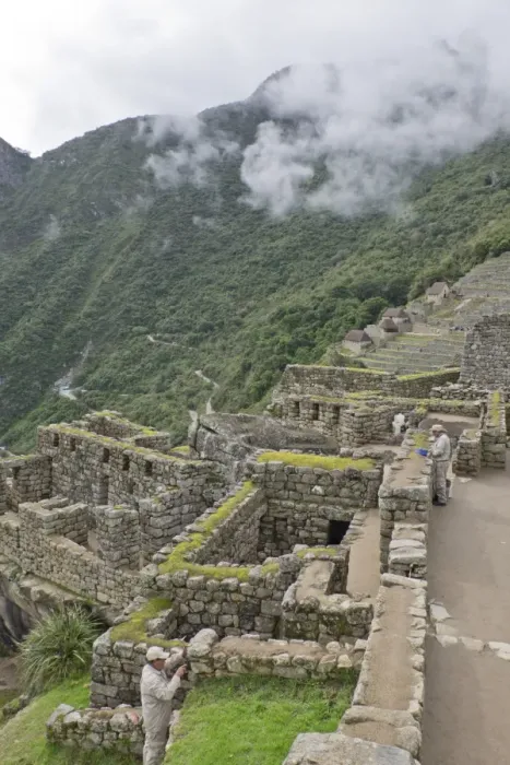Framed Print : Restoration work at the Inca ruins of Machu Picchu, UNESCO World Heritage Site, Peru Framed Print : Restoration work at the Inca ruins of Machu Picchu, UNESCO World Heritage Site, Peru