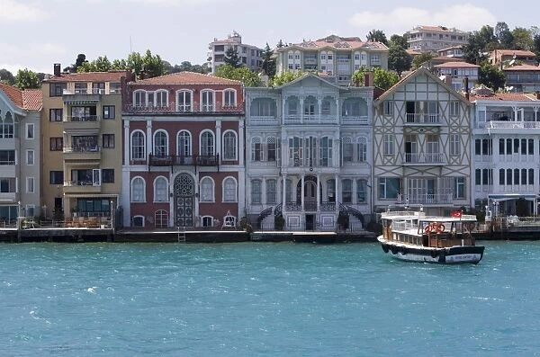 The restored waterfront buildings of Yenikoy on the Bosphorus, Istanbul, Turkey, Europe