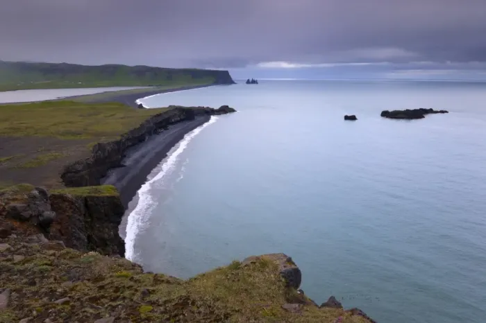 Framed Print : Reynisfjara black sand beach and Reynisdrangar sea stacks in the distance