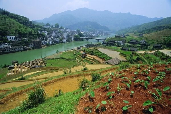 Rice paddies and brick-maker at Longsheng in northeast Guangxi Province, China
