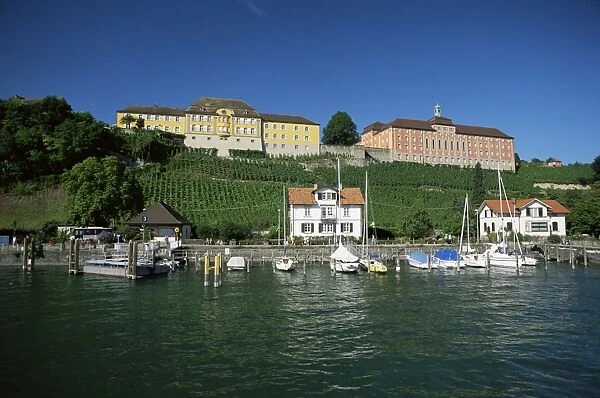 Richly decorated buildings above the harbour on Lake Constance
