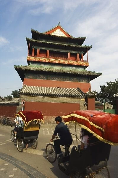 Rickshaw at the Drum Tower, a later Ming dynasty version originally built in 1273 marking the centre of the old Mongol capital, Beijing