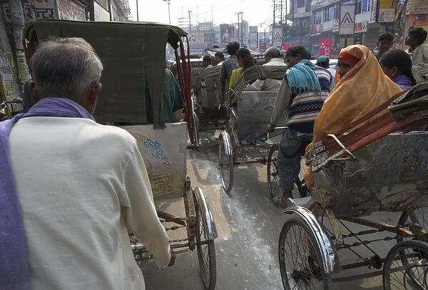 Rickshaw transport on busy street