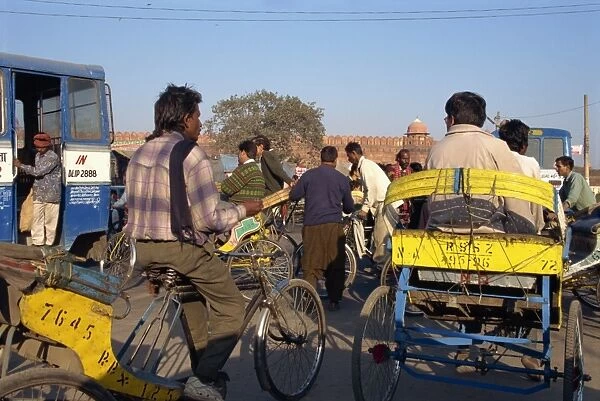 Rickshaws in traffic