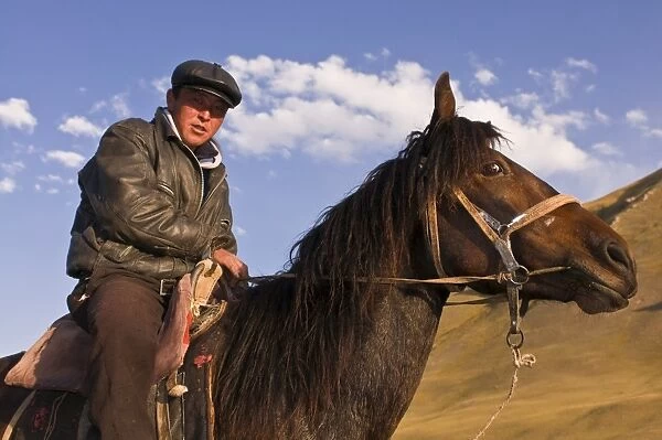 Rider with his horse in wilderness, Song Kol, Kyrgyzstan, Central Asia, Asia