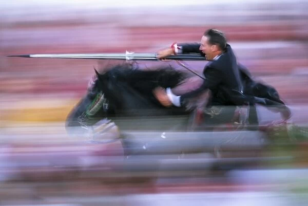 Rider speeding during the Medieval Games, festival celebrated on St