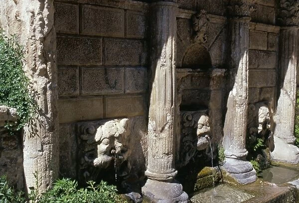 Rimondi fountain with spouting lion heads