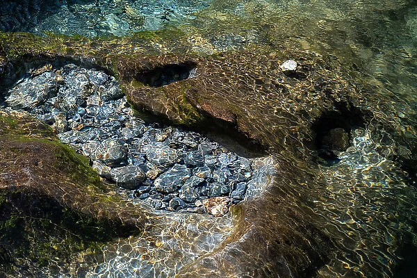 Ripples and Stone Patterns in the clear water of Afon Cwm Llan, Cwm Llan, The Watkin Path, Snowdonia National Park (Eryri), North Wales, United Kingdom, Europe