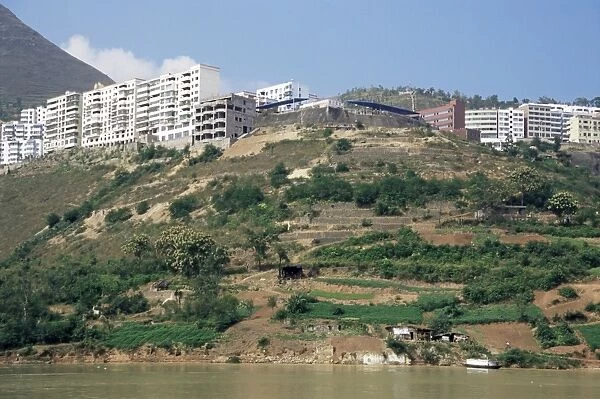 River bank land to be flooded, with new housing above reservoir level, Three Gorges Dam