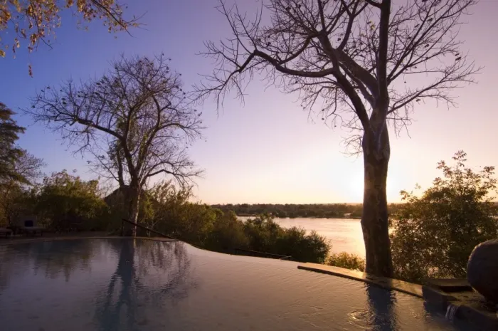 Framed Print : The River Club lodge, sunset on Zambesi River, Zambia, Africa Framed Print : The River Club lodge, sunset on Zambesi River, Zambia, Africa