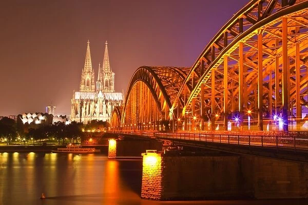 The River Rhine and Cologne Cathedral at night, Cologne, North Rhine-Westphalia, Germany, Europe