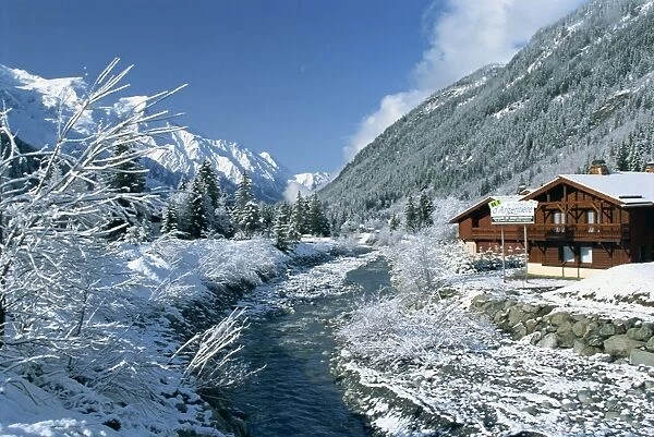 River running past chalets in the Les Grands Montets area, near Chamonix and Argentiere