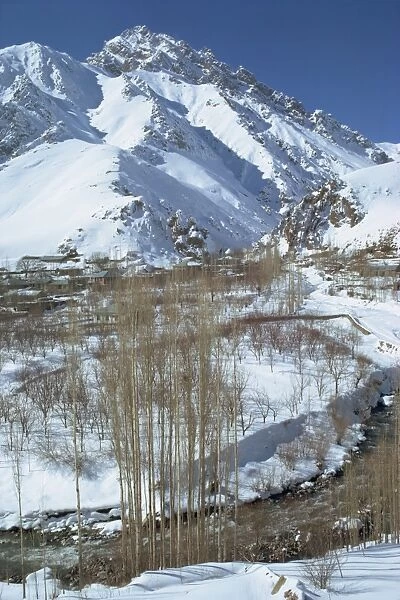River running through a snow covered Elborz Valley during winter